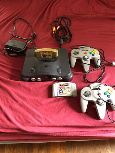 Nintendo 64 With Two Controllers, OG Smash, and Ocarina Of Time