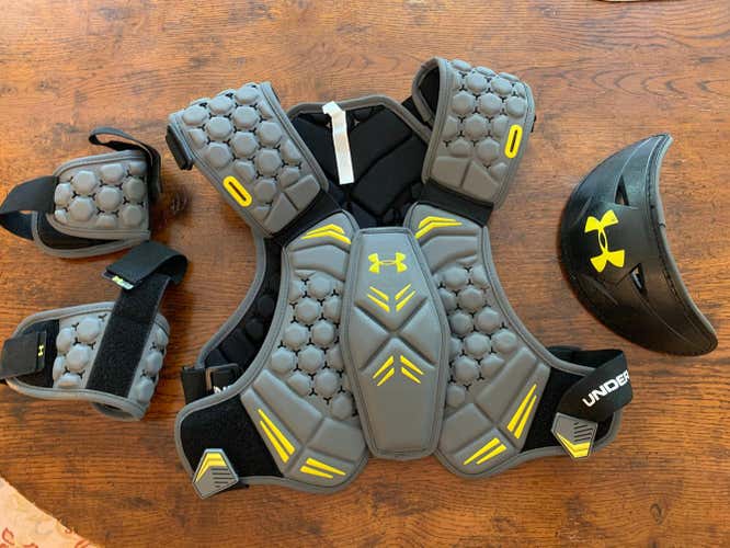 Bundled Notre Dame Team Issued Under Armour Shoulder Pads and Elbow Caps