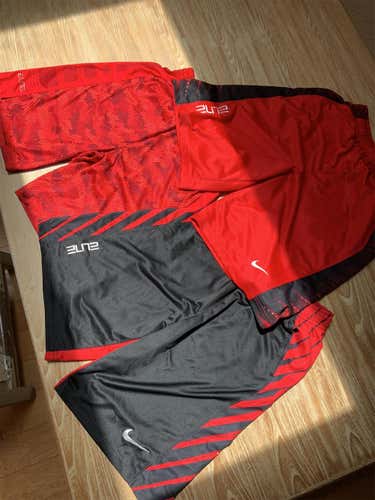 Red 2(Youth Large) & 1(Youth XL) Nike Shorts