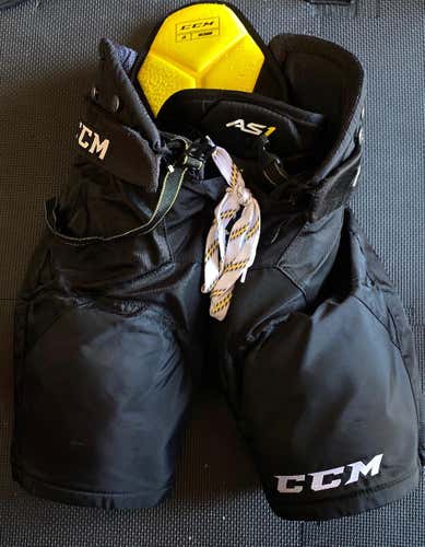 Black Used Junior Medium CCM AS1 Hockey Pants