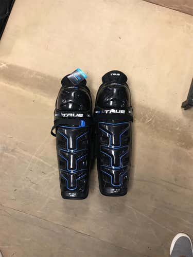 New True XC9 Shin Pads 16"