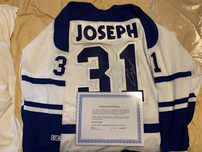Used CCM signed Curtis Joseph Jersey