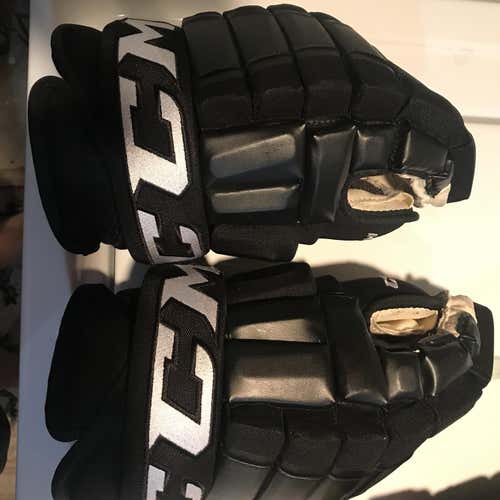 Black Used CCM HG98 14" Pro Stock Gloves