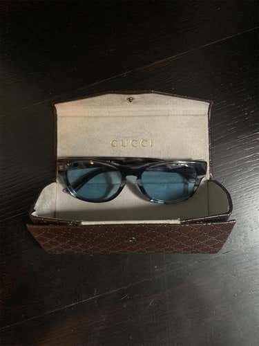 Blue Tinted Gucci Sunglasses. Barley Used. Case Is Beat In.