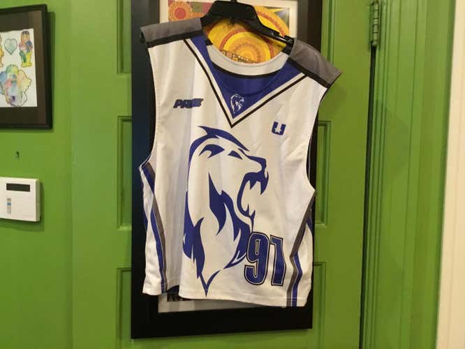 Blue Used Adult Men's Lge/ XL.  Universal lacrosse Jersey