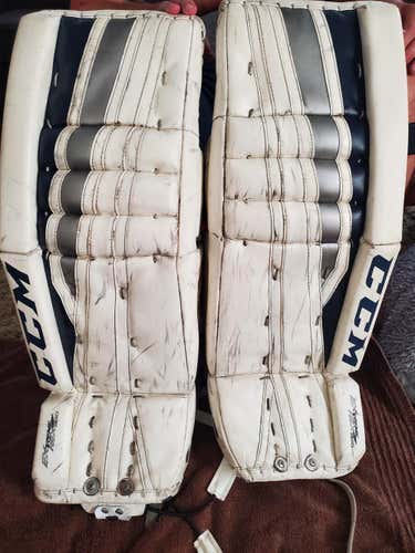 White Used Junior 29" CCM Extreme Flex 860 Goalie Leg Pads Pro Stock