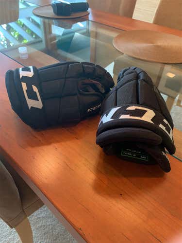 Black Used CCM Custom 4-roll 13" Pro Stock Gloves