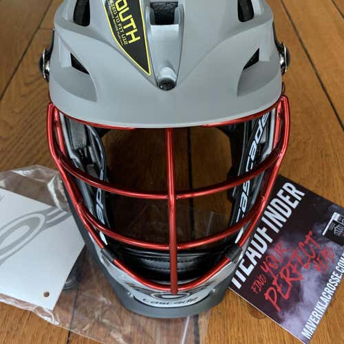 BNWT Cascade Youth S Helmet. Matte Gray Shell, Silver Jaw, Red Chrome Cage. Black strap