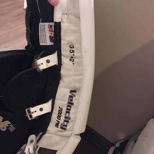 White Used 35" Vaughn Velocity V6 Pro Stock Goalie Leg Pads