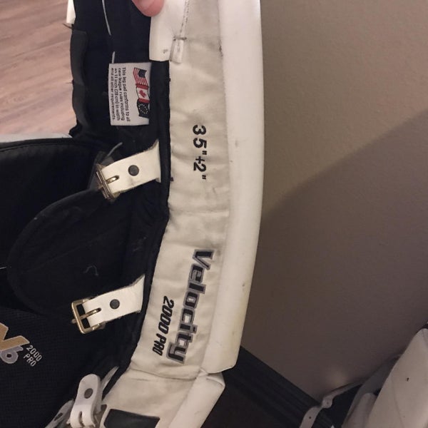 White Used 35" Vaughn Velocity V6 Pro Stock Goalie Leg Pads