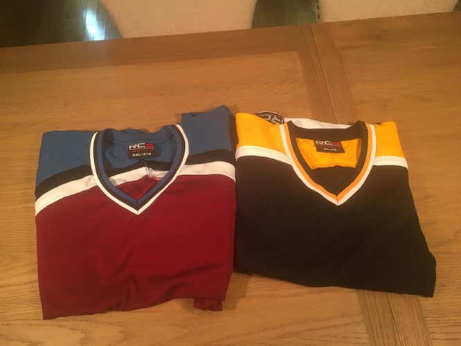 Two Used Adult XL  Goalie RCS Jersey Bruins, Rockies colors.
