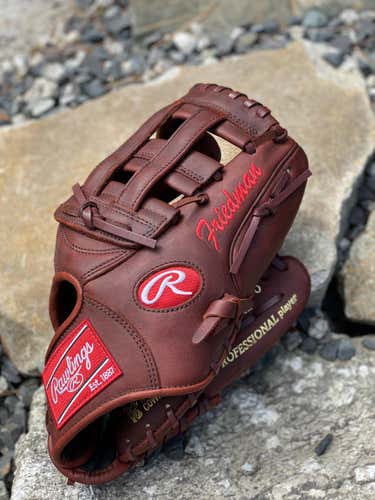Barely Used Wine Colored Rawlings Heart of the Hide 11.5" Glove