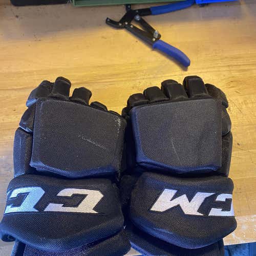 Black Used CCM HGTKPP 13" Pro Stock Gloves