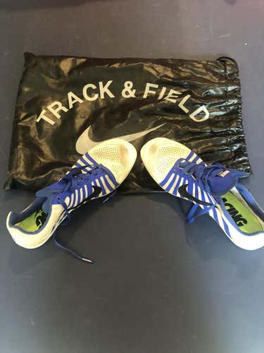 Nike Running Spikes Size 6. White/Blue Middle/High School track spikes.