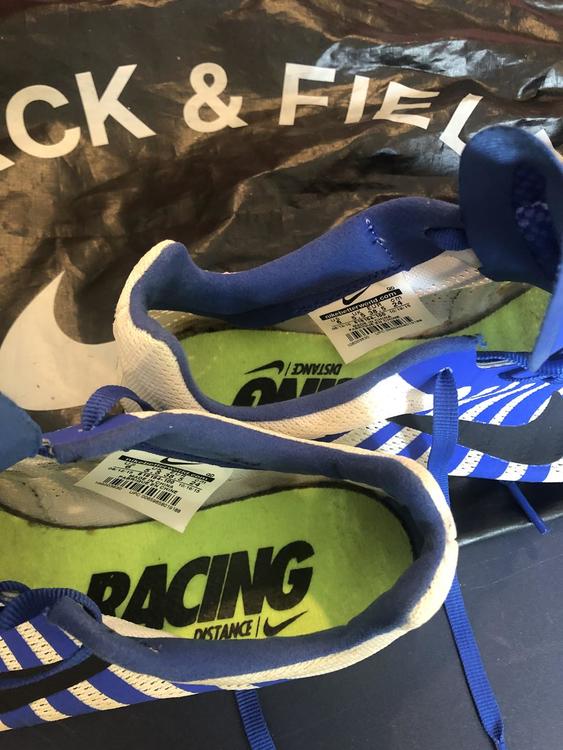 size 6 running spikes