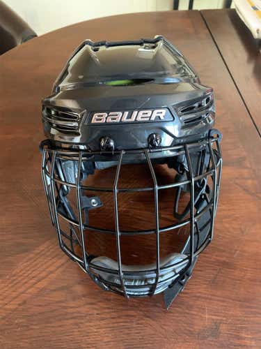 Black Used Medium Bauer Re-Akt 100  Helmet