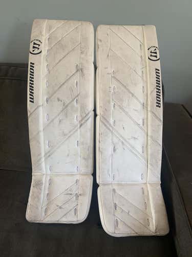 White Used Junior 28" Warrior Ritual G4 Goalie Leg Pads Pro Stock