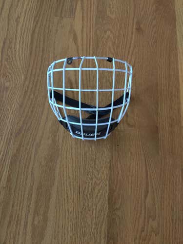 White Bauer hockey helmet cage