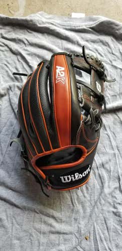 Wilson A2K 1787 Superskin 11.75" Lightly Used. Not Interested In Trading