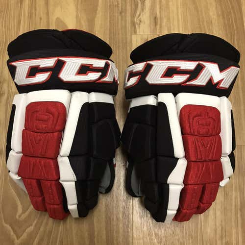 CCM U+ CL (Crazy Light) Hockey Gloves - Black/Red 14”