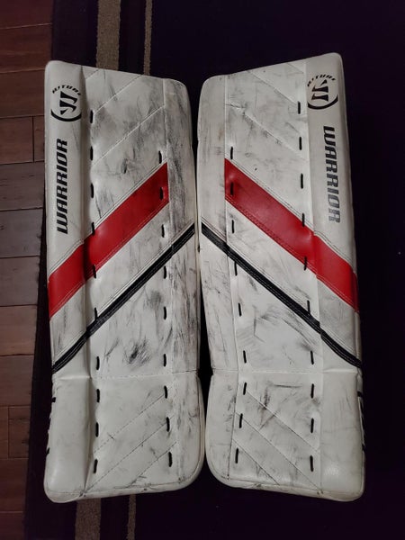 White Used Junior 24" Warrior Goalie Leg Pads