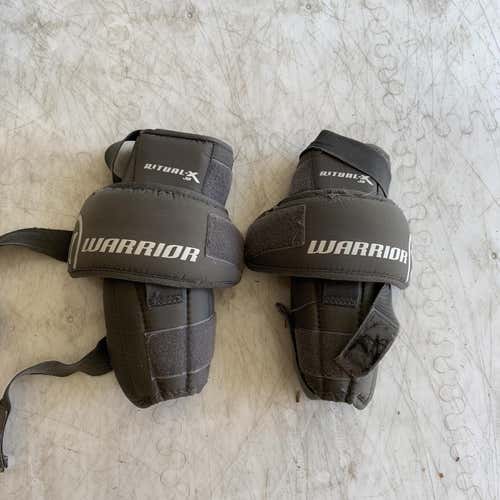Used Warrior Knee Guards - Junior