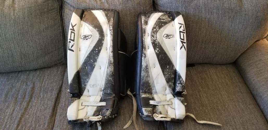 White Used Junior 27" Reebok Goalie Leg Pads