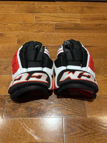 Black Used Senior CCM U+ Crazy Light Gloves 13"