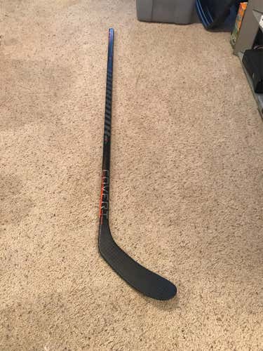 Lightly Used Warrior QRE SL Stick P28 Curve 63 Flex LH Grip