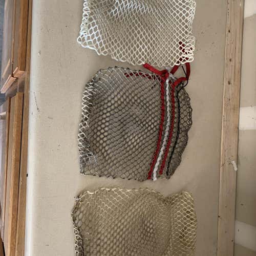 Three pieces of used goalie mesh