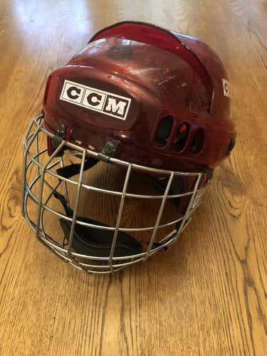 Used Medium CCM red opaque hockey Helmet