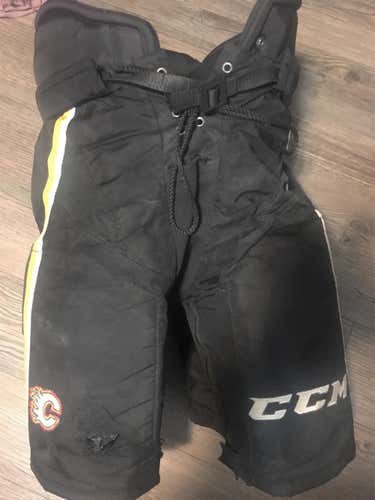 Black Senior Medium CCM HP35 Pro Stock Calgary Flames Hockey Pants