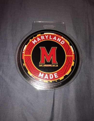 dgackey  Maryland team issued lot- 2 iron ons, one bag tag