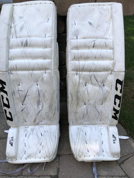 White Used Junior 30" CCM Extreme Flex E3.5 Goalie Leg Pads