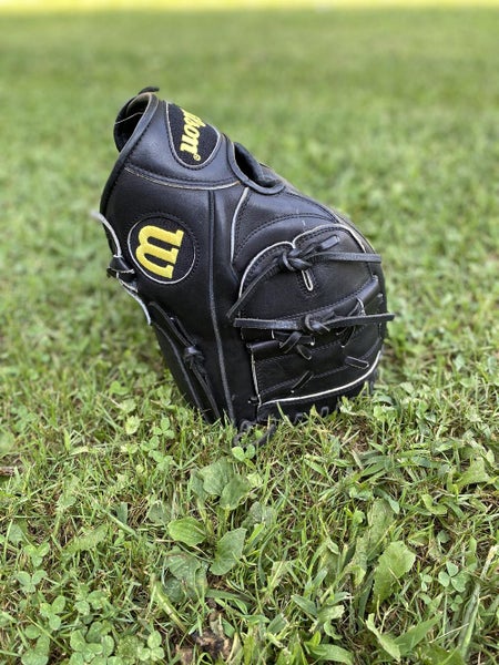 Black Used High School/College Wilson Right Hand Throw Pitcher's A2000 Baseball Glove 11.75"