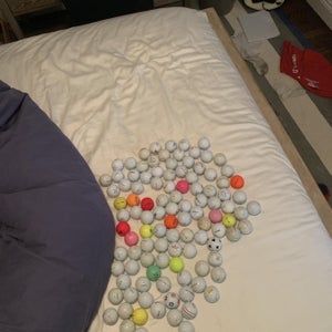 113 Slightly Used Golf Balls