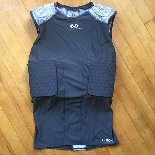 Mcdavid sleeveless shirt with pad protected ribs/obliques, and shoulders. Medium.
