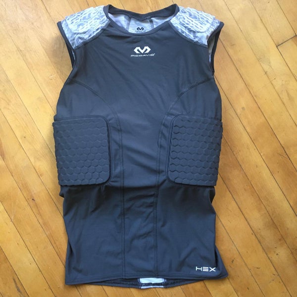 Mcdavid sleeveless shirt with pad protected ribs/obliques, and shoulders. Medium.