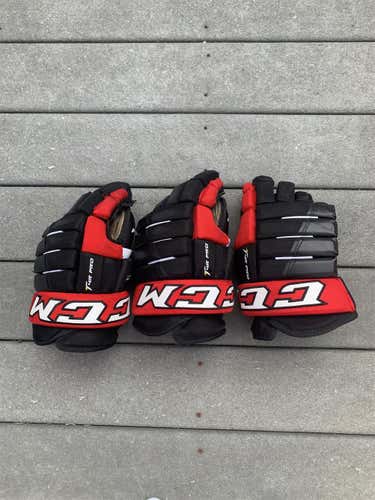 Black Senior CCM Tacks 4 Roll Pro 14"  Gloves