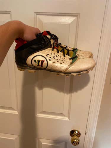 Cleats and 2 Shirts
