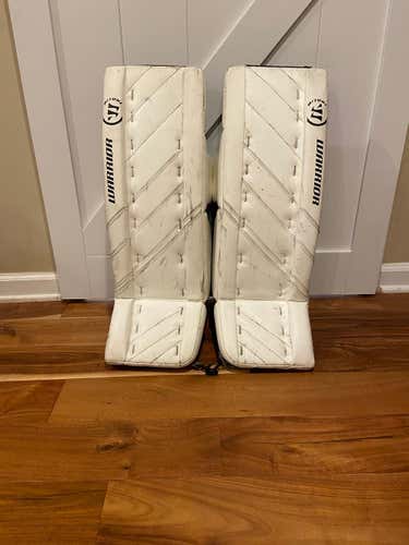 White Used Junior 26" Warrior Ritual G4 Goalie Leg Pads