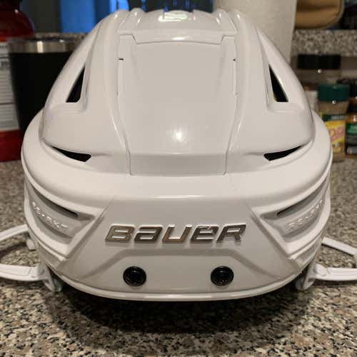 White Used Medium Bauer Re-Akt 150  Helmet