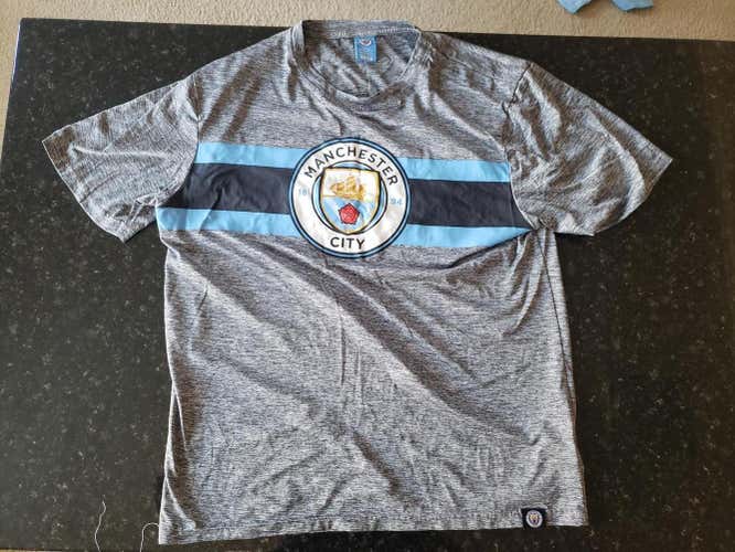 Official Manchester City athletic shirt (large)