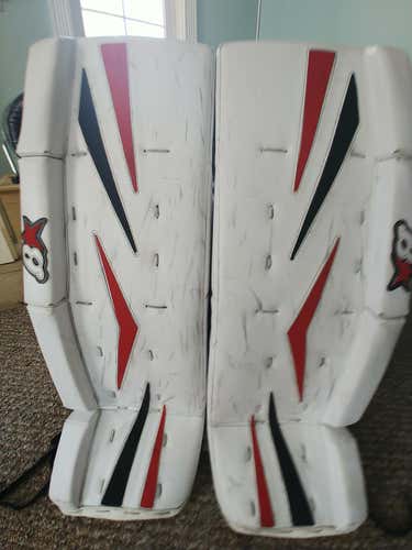 White Used Intermediate 31" plus 1 Brian's NetZero Goalie Leg Pads