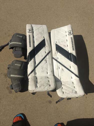 White Used Junior 28" Warrior Ritual G4 Goalie Leg Pads