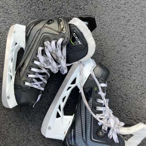 Junior CCM RibCor 44K pump Regular Width  Size 4 Hockey Skates