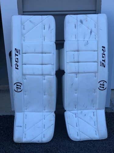 White Used Junior 26" Warrior Ritual GT2 Goalie Leg Pads
