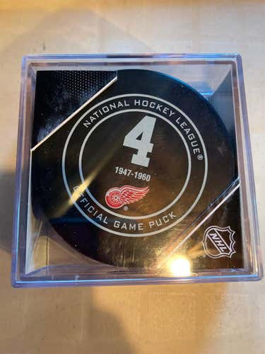 Red Kelly Jersey Retirement Puck In Case