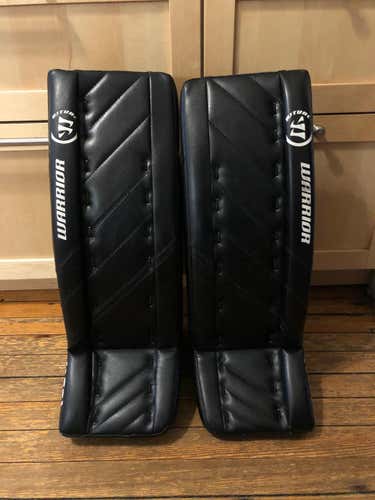 Black Used Junior 26" Warrior Ritual G4 Goalie Leg Pads