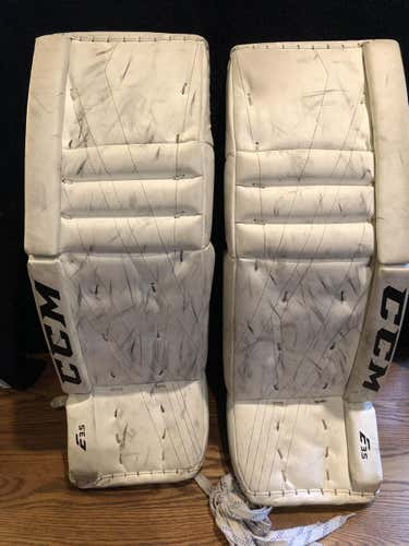 White Used Junior 30" CCM Extreme Flex E3.5 Goalie Leg Pads